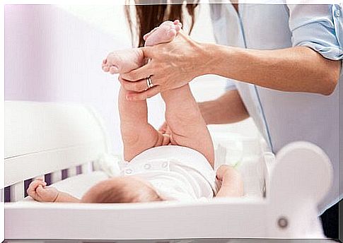 Changing diapers: feet up