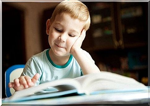 Smiling child with book