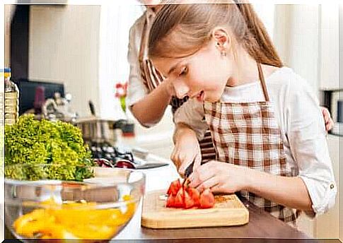 Mother and daughter cooking