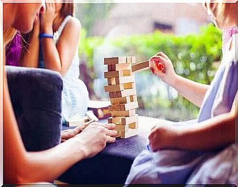 Family playing jenga