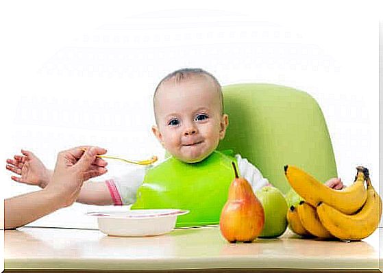 baby eats fruit