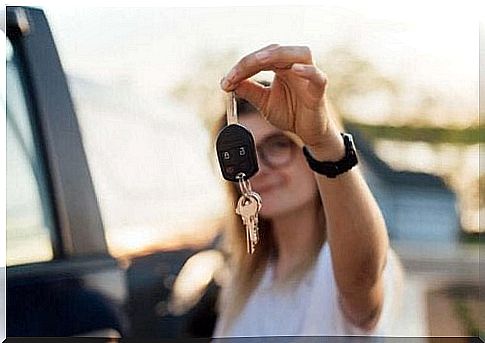 Woman with car key