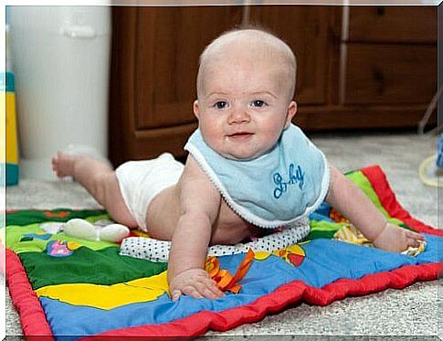 Baby on a play mat