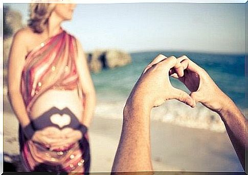 Pregnant woman on the beach