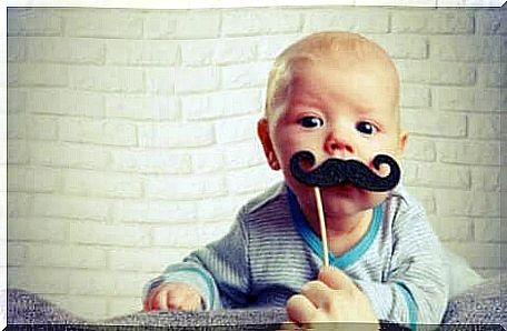 A baby with a mustache