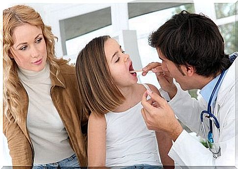 Girl being checked by a doctor